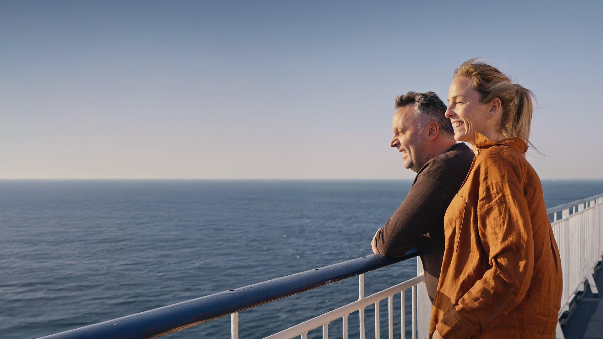 A couple admiring the view from deck