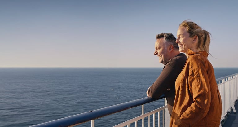 A couple admiring the view from deck